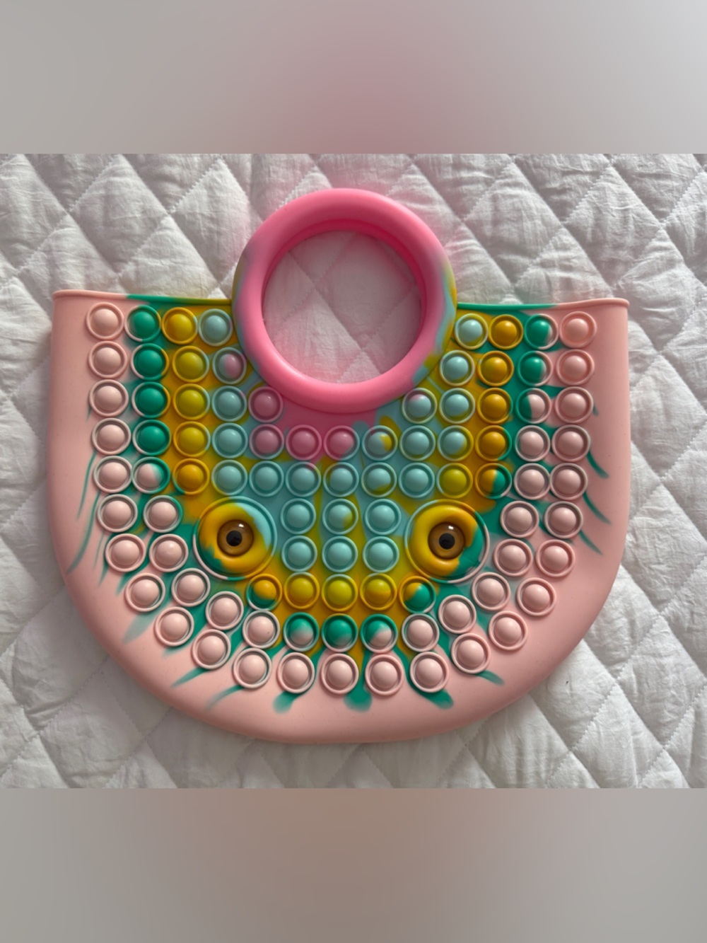 Pink Fish-Shaped Pop It Toy with Yellow and Teal Bubbles